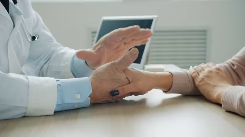 Weekend Ear Wax Removal Services and Clinical Approach: A doctor and patient during a consultation Doctor and patient consultation for Weekend Ear Wax Removal Services and Clinical Approach - Weekend Opening Hours At Hearin...