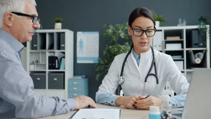How Referrals and Follow-Up Usually Work: A doctor in a clinic Doctor in clinic for How Referrals and Follow-Up Usually Work - GP Surgeries And Hospitals Near Hearing First St Albans